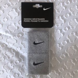 Nike gray swoosh wristbands